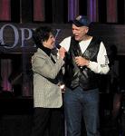 Sharing a laugh onstage with fellow Opry member Mike Snider